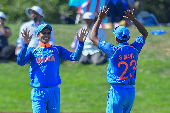 India's Shubman Gill (L) celebrates catching Pakistan's Hassan Khan with teammate Shivam Mavi during the U19 semi-final cricket World Cup match between India and Pakistan at Hagley Oval in Christchurch on January 30, 2018. U-19 World Cup Semi Final,U-19 World Cup,Shubman Gill,Ishan Porel,India beat Pakistan,U19 World Cup Final