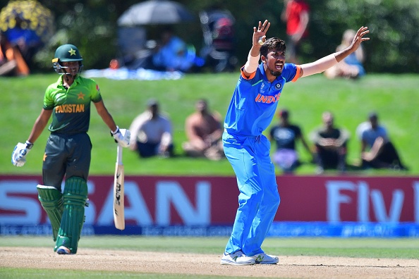 India's Ishan Porel (R) appeals for a leg-before-wicket call on Pakistan's Ammad Alam (L) during the U19 semi-final cricket World Cup match between India and Pakistan at Hagley Oval in Christchurch on January 30, 2018. U-19 World Cup Semi Final,U-19 World Cup,Shubman Gill,Ishan Porel,India beat Pakistan,U19 World Cup Final