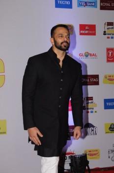 Rohit Shetty poses for photographers on his arrival at the 10th Mirchi Music Awards 2018