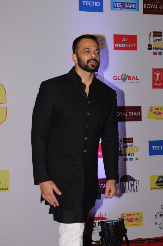 Rohit Shetty poses for photographers on his arrival at the 10th Mirchi Music Awards 2018 Rohit Shetty,Aditi Govitrikar,Gauhar Khan,Abhijeet Sawant,Amit Sadh,Lopamudra Raut,Kartik Aaryan,Mirchi Music Awards 2018,Mirchi Music Awards,celebs at Mirchi Music Awards