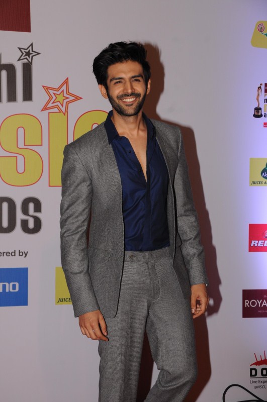 Kartik Aaryan poses for photographers on his arrival at the 10th Mirchi Music Awards 2018 Rohit Shetty,Aditi Govitrikar,Gauhar Khan,Abhijeet Sawant,Amit Sadh,Lopamudra Raut,Kartik Aaryan,Mirchi Music Awards 2018,Mirchi Music Awards,celebs at Mirchi Music Awards