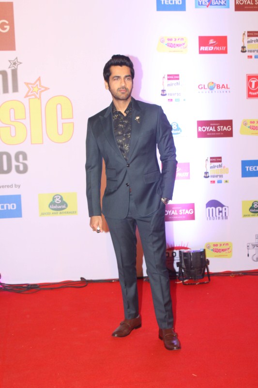 Arjan Bajwa gets clicked on his arrival at the 10th Mirchi Music Awards 2018, held at Dome, NSCI in Mumbai. Singer Bappi Lahiri,Bappi Lahiri,Neetu Chandra,AR Rahman,Devi Sri Prasad,Imtiaz Ali,Arjan Bajwa,Divya Dutta,Mirchi Music Awards 2018,Mirchi Music Awards,celebs at Mirchi Music Awards