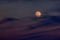 The Moon rises over the Mojave Desert before becoming a so-called 'super blue blood moon' when it becomes totally eclipsed before dawn, on January 30, 2018 near Amboy, California. The 'super blue blood moon' is a rare 'lunar trifecta' event in which the Moon is at its closest to the Earth, appearing about 14 percent brighter than usual, and is simultaneously a 'blue moon', the second full moon in the same month, as well as a total lunar eclipse or 'blood moon'. Such a lunar event that hasn't been seen since 1866.