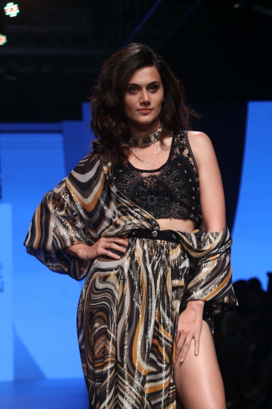 Taapsee Pannu walks the ramp during a fashion show at the Lakmé Fashion Week Summer Resort 2018 in Mumbai. Hansika Motwani,Taapsee Pannu,Huma Qureshi,Kunal Kapoor,Lakme Fashion Week 2018,Lakme Fashion Week,Lakme Fashion Week 2018 day 1,Lakme Fashion Week 2018 pics,Lakme Fashion Week 2018 images,Lakme Fashion Week 2018 stills,Lakme Fashion Week 2018 pictures,La