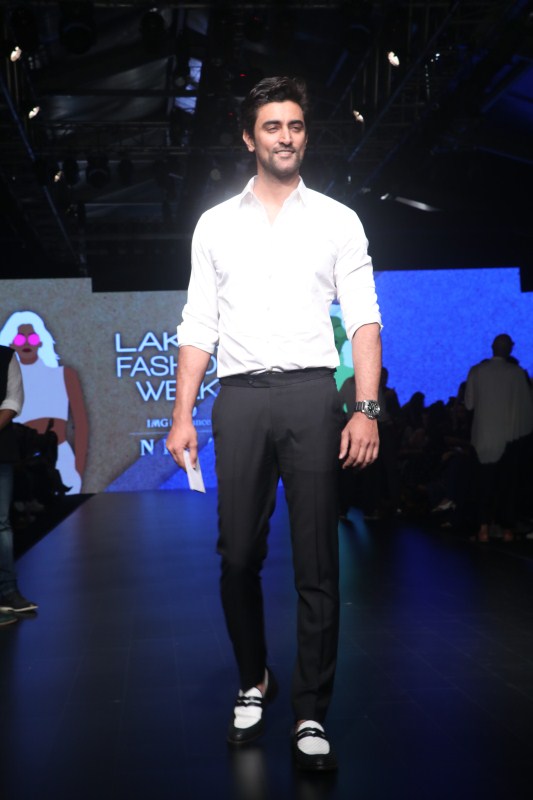 Kunal Kapoor walks the ramp during a fashion show at the Lakmé Fashion Week Summer Resort 2018 in Mumbai. Hansika Motwani,Taapsee Pannu,Huma Qureshi,Kunal Kapoor,Lakme Fashion Week 2018,Lakme Fashion Week,Lakme Fashion Week 2018 day 1,Lakme Fashion Week 2018 pics,Lakme Fashion Week 2018 images,Lakme Fashion Week 2018 stills,Lakme Fashion Week 2018 pictures,La