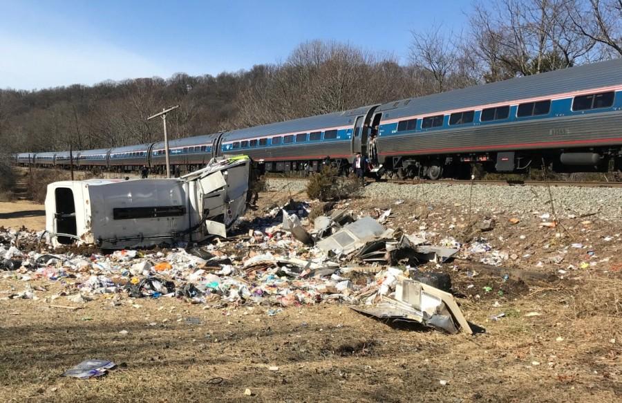 An Amtrak passenger train carrying Republican members of Congress from Washington to a retreat in West Virginia is seen after colliding with a garbage truck in Crozet, January 31, 2018 Amtrak passenger train,Amtrak train,Virginia,Virginia road crossing,garbage truck
