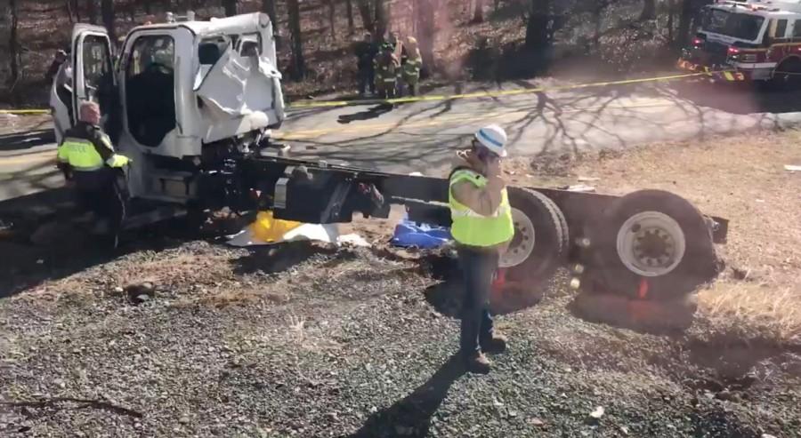 View of the scene following the accident, in this picture grab obtained from social media video. Amtrak passenger train,Amtrak train,Virginia,Virginia road crossing,garbage truck