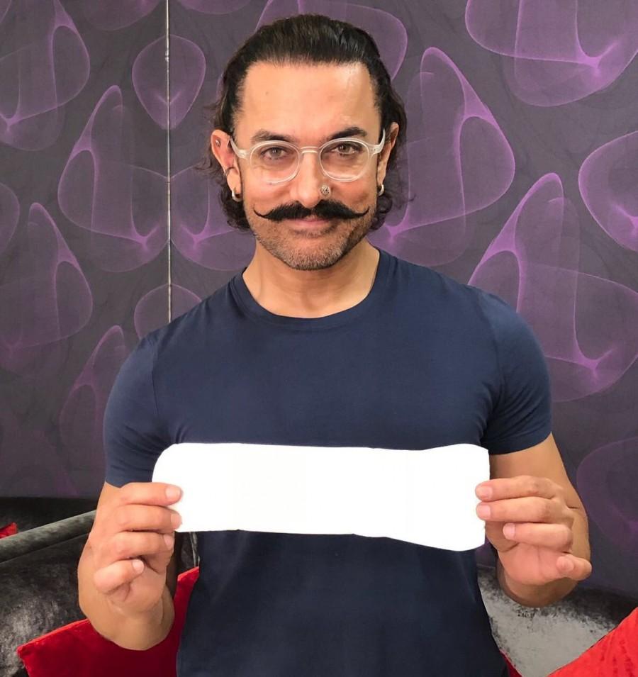 Aamir Khan shares his photo with a sanitary pad on Social media. Aamir Khan,Akshay Kumar,Sonam Kapoor,Radhika Apte,Alia Bhatt,PadMan challenge,PadMan,PadMan promotion,sanitary pad