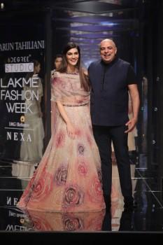 Bollywood actress Kriti Sanon, dressed in a nude tulle lehenga-choli lent a dreamy end to ace designer Tarun Tahiliani's show at Lakme Fashion Week (LFW) Summer/Resort 2018. 