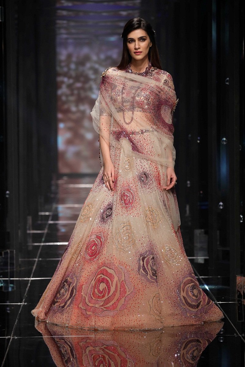 The core inspiration appeared to be the celestial universe and its constellations of stars that twinkled in a wide array of colours and glittered on the garments to enchant the audience. Kriti Sanon,Kriti Sanon bridal look,Kriti Sanon at LFW show,Kriti Sanon at Lakme Fashion Week,Lakme Fashion Week,Lakme Fashion Week 2018