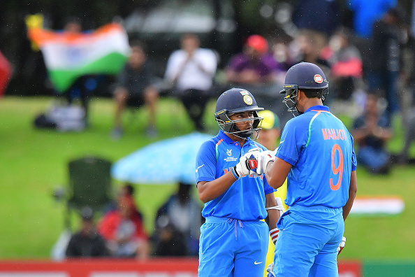ndia's Manjot Kalra (R) celebrates after hitting a four with teammate Prithvi Shaw (R) during the U19 cricket World Cup final match between India and Australia at Bay Oval in Mount Maunganui on February 3, 2018. Manjot Kalra,ICC U19 World Cup final,U19 World Cup final,World Cup final,Manjot Kalra 100,Manjot Kalra century