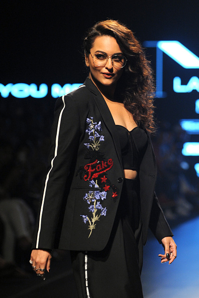 Indian Bollywood actress Sonakshi Sinha showcases a creation by designer Falguni Shane Peacock at the Lakmé Fashion Week (LFW) Summer Resort 2018 in Mumbai on February 2, 2018. Lakme Fashion Week 2018,lakme fashion week,Karan Johar and Sonakshi Sinha,Karan Johar,Sonakshi Sinha,Falguni and Shane Peacock