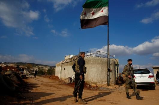 Turkish-backed Free Syrian Army fighters are seen near Mount Barsaya in Qastal village, Azaz city Syria, February 1, 2018.