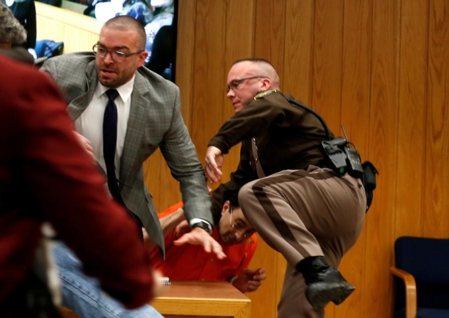 Randall Margraves was nearly within striking distance of Nassar before court guards tackled him roughly to the ground in front of his shocked daughters. The judge later accepted Margraves' account that he "lost control" of his emotions as he listened to his daughters describe Nassar's abuse and said she would not punish him. Larry Nassar lunges,Larry Nassar lunges father,Larry Nassar in Court