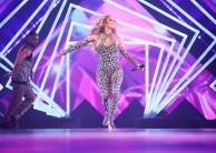 Singer-actress Jennifer Lopez, who went through eight costume changes for a pre-Super Bowl concert in Minneapolis, grabbed eyeballs with her famous curves in a skin-tight leopard-print catsuit.