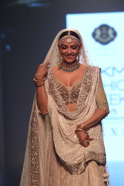 The exotic regal occasion wear was royal attire, dappled with a generous dose of pearls and sequins. The flowing capes and shrugs that adorned the classic shararas and saris were visions of beauty as they floated down the ramp on glamorous models. Sushmita Sen,actress Sushmita Sen,hot Sushmita Sen,Sushmita Sen at LFW,Sushmita Sen at Lakme Fashion Week,Lakme Fashion Week
