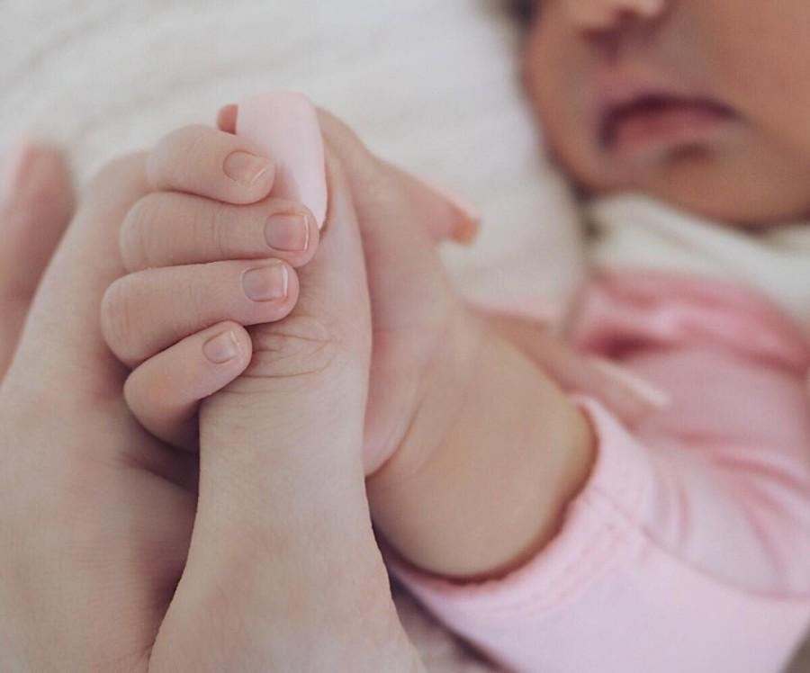 Reality TV personality Kylie Jenner and rapper Travis Scott have named their daughter Stormi. In an Instagram post, Kylie posted an image of her holding her daughter's hand with the caption: "Stormi", reports the thesun.co.uk. Although Kylie and her boyfriend Travis Scott have yet to reveal the reason they chose the moniker, some baby name websites say the name means having "charm" and being able to "attract money". Another website claims Stormi means someone who is a "free spirit" and has the "biggest heart". Kylie Jenner,Travis Scott,Kylie Jenner daughter,Kylie Jenner daughter Stormi,Kylie Jenner daughter Stormi pics,Kylie Jenner daughter Stormi images,Kylie Jenner daughter Stormi stills,Kylie Jenner daughter Stormi pictures,Kylie Jenner daughter Stormi photo