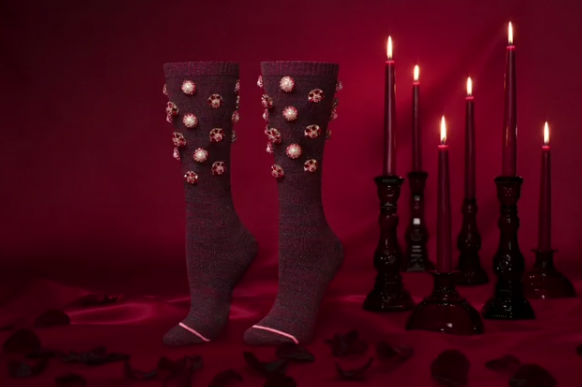 Rihanna wrote on the micro-blogging website: "Happy Valentine's ladies. My newest collaboration with stance drops tonight! Get the Cold Hearted collection at Midnight PST." Singer Rihanna,Rihanna,Singer Rihanna unveils socks,Valentine's Day,Rihanna pics,Rihanna images,Rihanna stils,Rihanna pictures,Rihanna photos