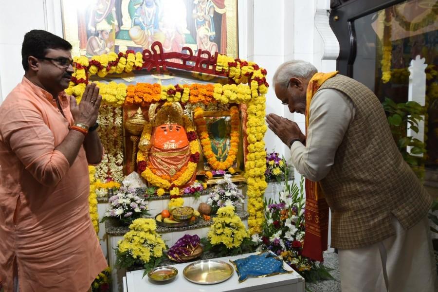 Prime Minister Narendra Modi prays at the Shiva Temple in Muscat. One of the oldest temples in the region, it is situated in Muscat. Narendra Modi,Narendra Modi at Shiva temple,Narendra Modi in Muscat,PM Narendra Modi