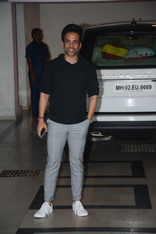 Tusshar Kapoor poses for the cameras during Karan Johar's Valentine's day party. Karan Johar,Valentine's Day,Karan Johar Singles party,karan johar valentine's day party,ekta kapoor,Sonakshi Sinha,athiya shetty,Sussanne Khan,Love disappoints,Karan Johar's quirky Valentine's Day party,manish malhotra,karan johar part