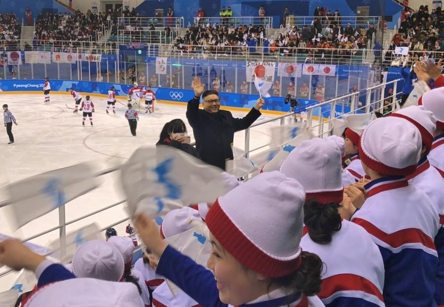 A man impersonating North Korean leader Kim Jong Un waves in the stands as a unified Korean team play Japan at the Pyeongchang Games. Kim Jong Un,Kim Jong Un lookalike,Celebs lookalike,2018 Winter Olympics,Kim Jong Un lookalike pics,Kim Jong Un lookalike images,Korean hockey team
