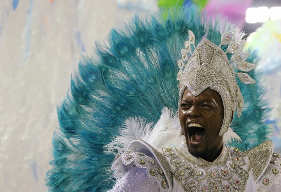 A reveller from Unidos da Tijuca Samba school performs during the second night of the Carnival parade at the Sambadrome in Rio de Janeiro, Brazil. Famous Carnival,Carnival in Brazil,Sabrina Sato,Famous Carnival pics,Famous Carnival images