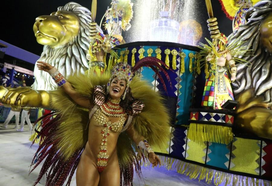 A reveller from Paraiso do Tuiuti Samba school performs during the first night of the Carnival parade at the Sambadrome in Rio de Janeiro. Famous Carnival,Carnival in Brazil,Sabrina Sato,Famous Carnival pics,Famous Carnival images