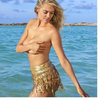 American model Kate Upton poses topless for Sports Illustrated.