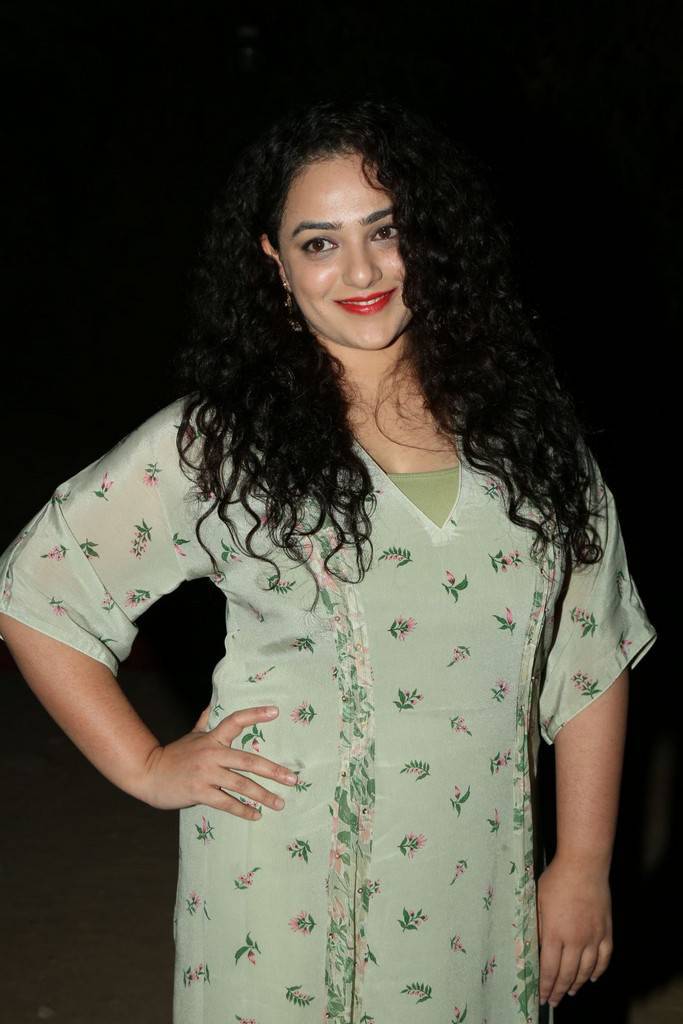Nithya Menen gets clicked on her arrival at Awe pre-release event. Nani,Anushka Shetty,Kajal Agarwal,Nithya Menen,SS Rajamouli,Awe pre-release event,Awe pre-release,telugu movie Awe,Awe,Awe poster,Awe wallpaper