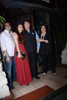 Randhir Kapoor poses for photographers with Karisma Kapoor and Babita Kapoor during birthday party, held at China Garden in Khar, Mumbai.