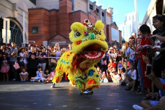 Performers dressed in costumes dance for spectators as part of celebrations for the Chinese Lunar New Year and marking the Year of the Dog in Sydney, Australia.