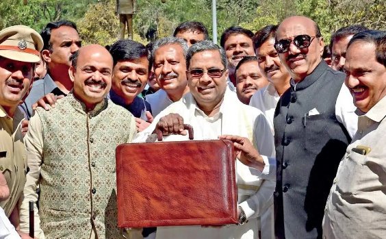 With an eye on Assembly election, due in late April or early May, Karnataka Chief Minister Siddaramaiah on Friday presented a popular state budget for fiscal 2018-19 to please all sections of society. Barring 8 per cent increase in additional excise duty on Indian-made liquor, the budget spared the people from fresh taxes despite Rs 151.30 crore deficit on capital account (revised estimates) on steep hike in borrowings. Siddaramaiah,CM Siddaramaiah,Karnataka Chief Minister Siddaramaiah,Siddaramaiah budget,Siddaramaiah budget 2018