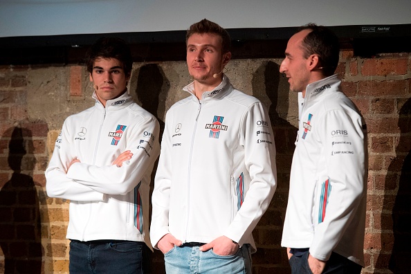 Canadian racing driver Lance Stroll (L), Russian racing driver Sergey Sirotkin (C) and Polish racing driver Robert Kublitsa answer questions during the Williams Formula One 2018 season launch in London on February 15, 2018. Claire Williams,Williams F1,2018 season car,Formula One challenger,Williams Mercedes FW41