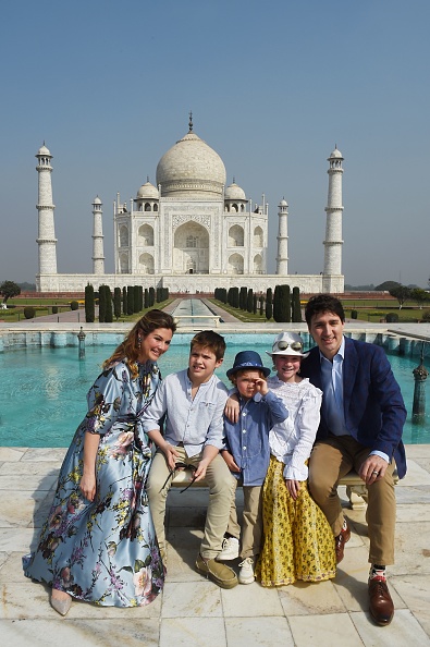 Prime Minister of Canada Justin Trudeau prepares with his children before a photo opportunity during their visit to the Taj Mahal in Agra on February 18, 2018. Trudeau and his family arrived at the Taj Mahal on February 18, kickstarting their week-long trip to India aimed at boosting economic ties between the two countries. Sophie Gregoire,Justin Trudeau,Ella-Grace,Justin Trudeau in Taj Mahal,Canadian Prime Minister