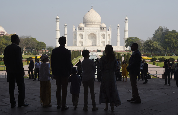 Prime Minister of Canada Justin Trudeau (3L), his wife Sophie Gregoire (2R) and their children are silhouetted as they arrive for their visit to Taj Mahal in Agra on February 18, 2018. Trudeau and his family arrived at the Taj Mahal on February 18, kickstarting their week-long trip to India aimed at boosting economic ties between the two countries. Sophie Gregoire,Justin Trudeau,Ella-Grace,Justin Trudeau in Taj Mahal,Canadian Prime Minister