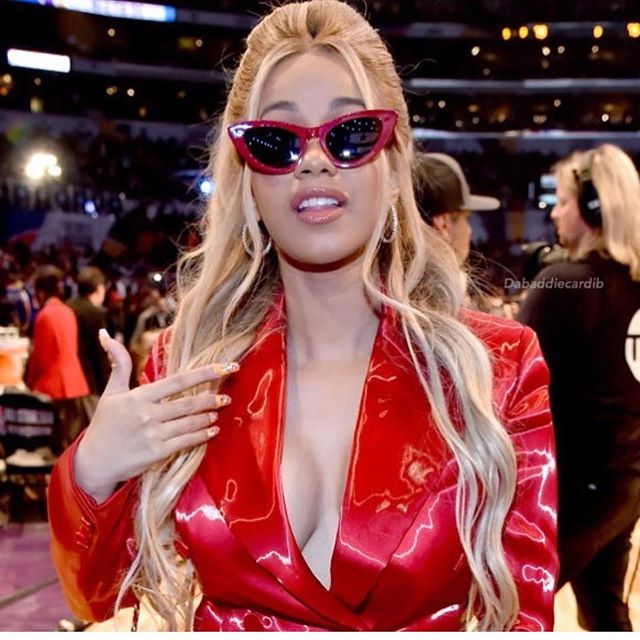 American rapper Cardi B flashes her cleavage in plunging jacket at NBA All-Star Game. Cardi B,cardi b instagram,Cardi B cleavage,Cardi B cleavage pics,Cardi B hot pics,Cardi wallpaper,hollywood celebs,hot hollywood celebs
