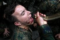 A U.S. Marine drinks the blood of a cobra during a jungle survival exercise as part of the "Cobra Gold 2018" (CG18) joint military exercise, at a military base in Chonburi province, Thailand.