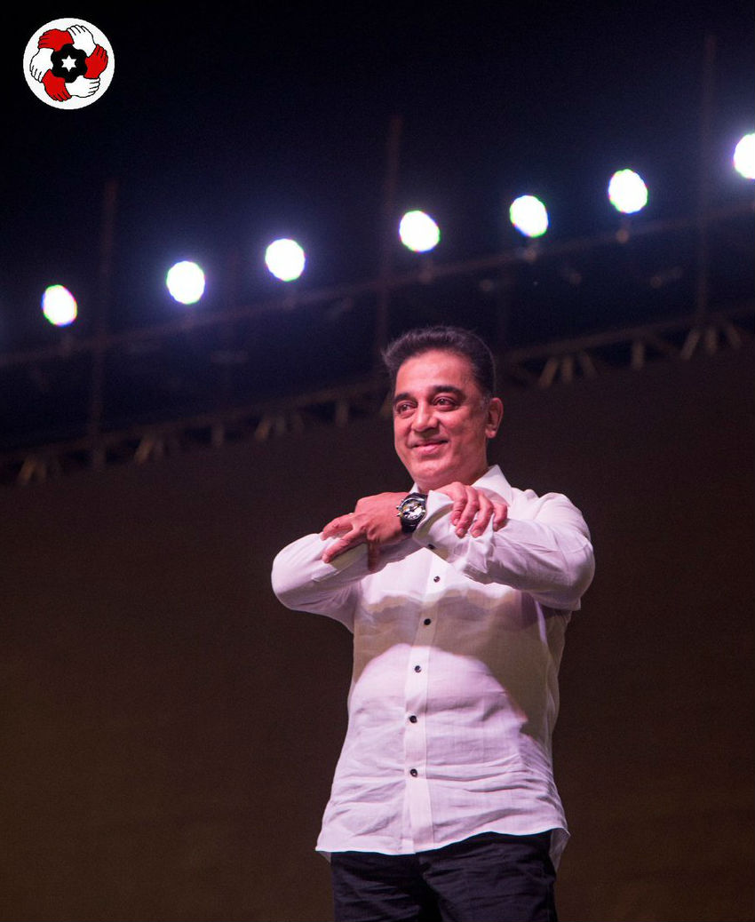 Actor-turned-politician Kamal Haasan on Wednesday formally launched his political party called Makkal Neethi Maiam (People Justice Centre). He also unfurled his party's flag, which has six hands - three in red and three in white - joined together around a star on a white background. Kamal Haasan,Kamal Haasan party,kamal haasan politics,Kamal Haasan party launch,Makkal Needhi Maiam,Ulaganayagan