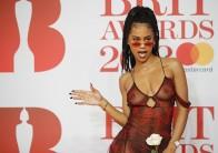 Diana De Brito, known as IAMDDB poses on the red carpet on arrival for the BRIT Awards 2018.
