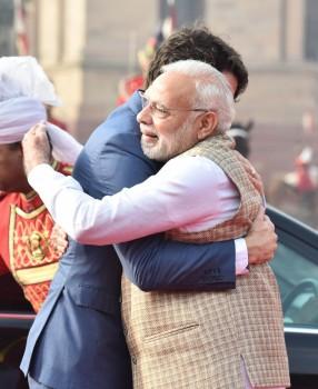 Prime Minister Narendra Modi met his Canadian counterpart Justin Trudeau on Friday welcoming him with a hug ahead of a ceremonial reception at the Rashtrapati Bhavan, putting to rest speculations about the government cold-shouldering the visiting dignitary.