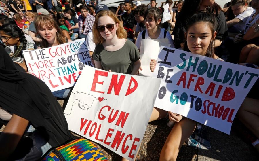 Students who walked out of their Montgomery County, Maryland, schools protest against gun violence in front of the White House in Washington, February 21, 2018. Florida shooting survivors,Donald Trump,US President Donald Trump,Marjory Stoneman Douglas High School,gun control push