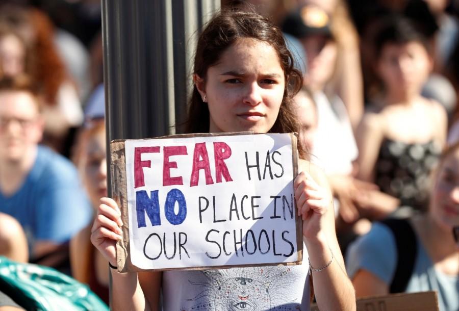 Students who walked out of their classes at Montgomery County, Maryland schools, protest against gun violence in front of the White House in Washington, U.S., February 21, 2018. Florida shooting survivors,Donald Trump,US President Donald Trump,Marjory Stoneman Douglas High School,gun control push