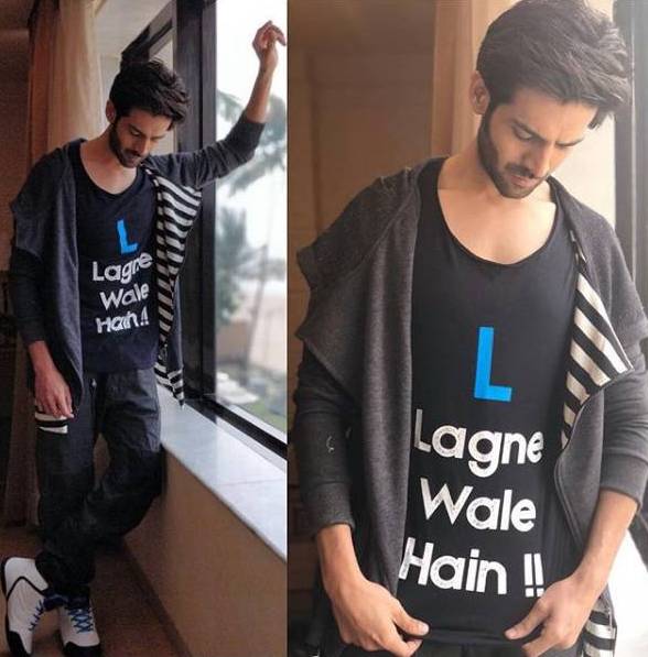 Kartik Aaryan in Hoodie – Aura Hub, Joggers – G Straw Raw, Sneakers – Fila. Sonu Ke Titu Ki Sweety,Sonu Ke Titu Ki Sweety actor,Kartik Aaryan,actor Kartik Aaryan,Kartik Aaryan style,Kartik Aaryan looks,Kartik Aaryan wallpaper,Kartik Aaryan poster