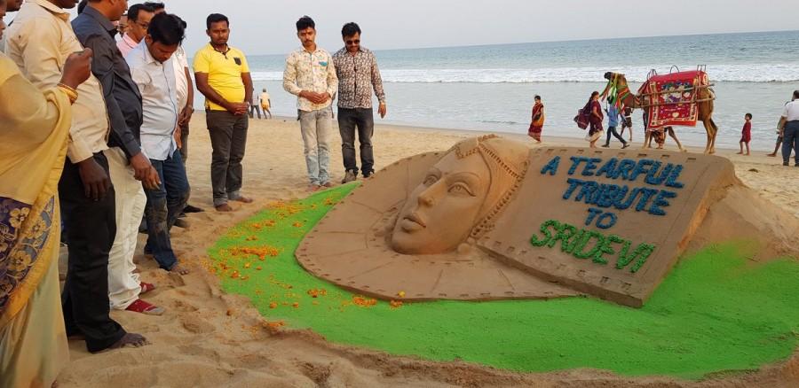 Sand Artist Manas Sahoo pays tribute to legendary actress Sridevi at Puri sea beach. Manas Sahoo,Sand artist Manas Sahoo,Sridevi,Sridevi sand art,Sridevi death,Sridevi passes away