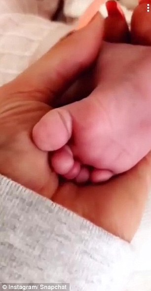 "Mommy's cute little toes," Kylie could be heard saying while rubbing Stormi's foot. Kylie Jenner,Kylie Jenner daughter,Kylie Jenner daughter Stormi,Stormi,Snapchat,Kylie Jenner snapchat,Kylie Jenner pics,Kylie Jenner images,Kylie Jenner poster,Kylie Jenner wallpaper