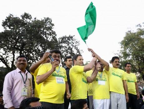 Clad in yellow T-shirt and blue jeans, Gandhi joined party's state unit leaders and cadres who assembled at the 17th century tomb of king Mohammed Adil Shah for the 