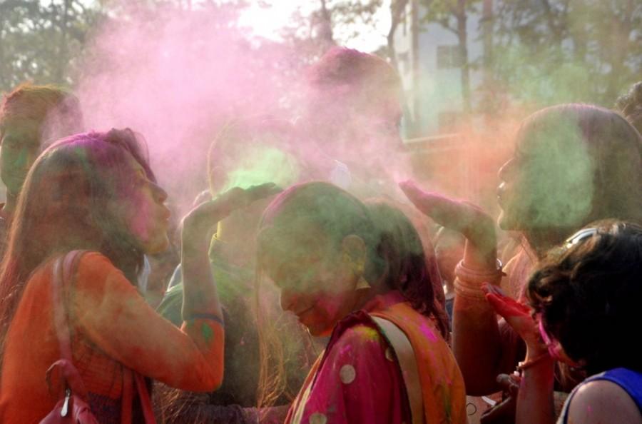 Students play Holi during Basanta Utsav celebrations at Rabindra Bharati University on Feb 26, 2018. Holi,Holi celebration,holi celebration in india,holi celebration photos,Holi celebration pics,Basanta Utsav,Basanta Utsav celebrations
