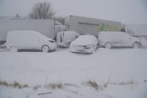 Several trucks and cars stand deserted after a pileup near Sjobo, Sweden.