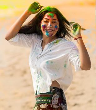 Actress Ramya Subramanian celebrating Holi festival in Chennai.