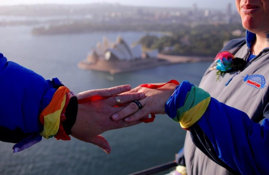 Warren Orlandi and Pauly Phillips display their rings after they became the first same-sex couple to marry atop of the Sydney Harbour Bridge, just two days out from the 40th anniversary of the Sydney Gay and Lesbian Mardi Gras, in Australia, March 1, 2018. Sydney Harbour Bridge,Warren Orlandi and Pauly Phillips,Warren Orlandi,Pauly Phillips,same sex wedding